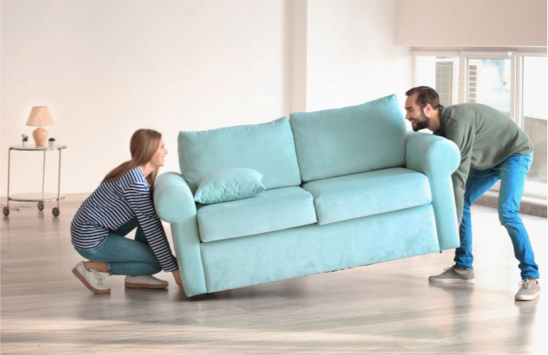 Couple moving sofa | Carpet Source